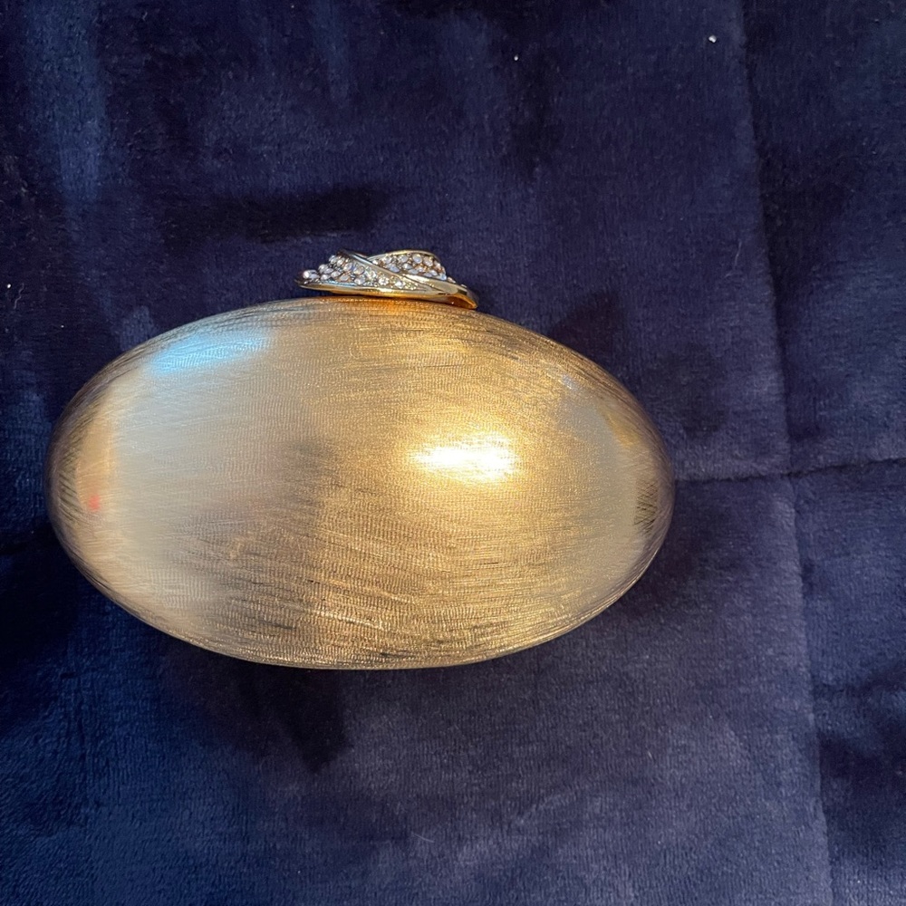 Rodo, made in Italy, elegant gold egg shaped evening clutch